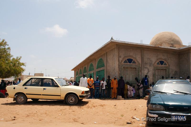 20090529_141247 D3 P1 P1.jpg - People lined up in prayer outside mosque